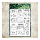 A sheet of clear stamp-like stamps with many vintage French postmark and address designs, displayed on a textured beige background. The sheet has a green header card reading 'Kell Style' and 'Paper Stamp Sheets'.