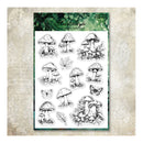 A sheet of clear stamp designs featuring black line drawings of mushrooms, leaves, and butterflies, presented on a decorative beige textured background.