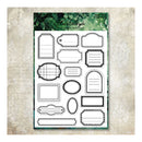 A sheet of clear emboscing paper craft stamps with black outline labels and frames, displayed on a textured beige background with a green floral header card.