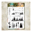 A sheet of clear stamps with black outdoor-themed designs including mountains, trees, stars, moons, and phrases like 'Keep them bright' and 'Helen Style', displayed on a textured beige background.