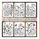Six floral stencil templates with black wildflower silhouettes on white sheets, arranged in two rows on a wood background with a floral pattern strip between the top row.