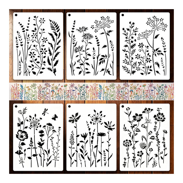 Six floral stencil templates with black wildflower silhouettes on white sheets, arranged in two rows on a wood background with a floral pattern strip between the top row.