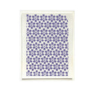 A framed art print featuring a repeating pattern of purple stylized flowers on a white background, enclosed in a thin white frame.