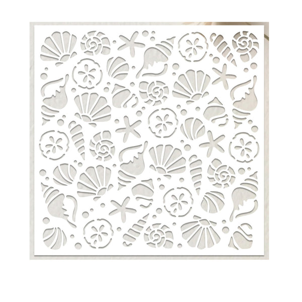 A square white decorative stencil or cutout panel featuring an all-over pattern of seashells, starfish, and floral motifs, shown against a plain white background.