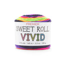 A single skein of Premier Sweet Roll Vivid yarn on a clean white background. The yarn is multicolored with stripes of purple, orange, yellow, green, and pink, wrapped in a white paper label with the brand and product name clearly visible.