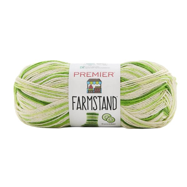 Green and white yarn ball with 'Premier Farmstand' label on a white background