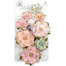 A package of 8 pastel paper flowers by Prina, featuring soft pink, peach, lavender, and mint green blossoms with glittery gold centers and green leaves, attached to a white cardboard backing.