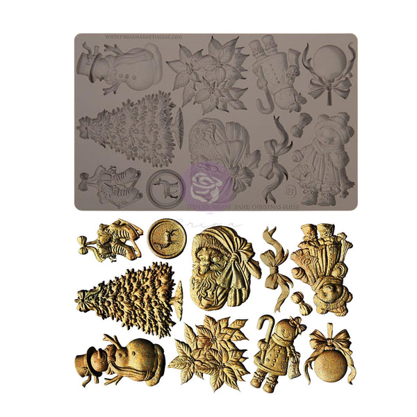 A rectangular silicone baking mold shown above several example holiday-themed embossed pieces, with dimension lines indicating 8 inches by 5 inches. The mold has multiple recessed Christmas designs including a tree, snowman, ornament, rabbit, and floral motifs.