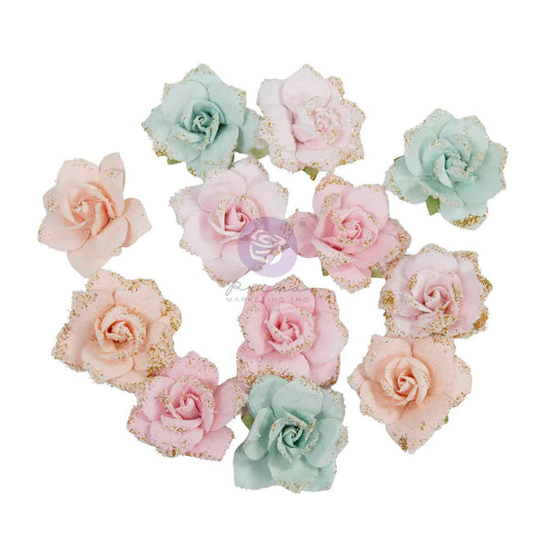 Twelve artificial fabric roses in pastel shades of pink, peach, mint green, and lavender, each trimmed with glittery gold edges, arranged on a plain white background.