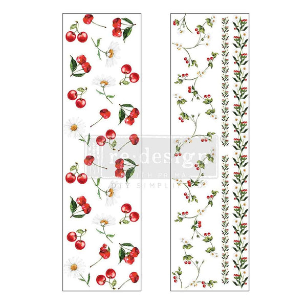 Decorative border with red cherries and green leaves on a white background