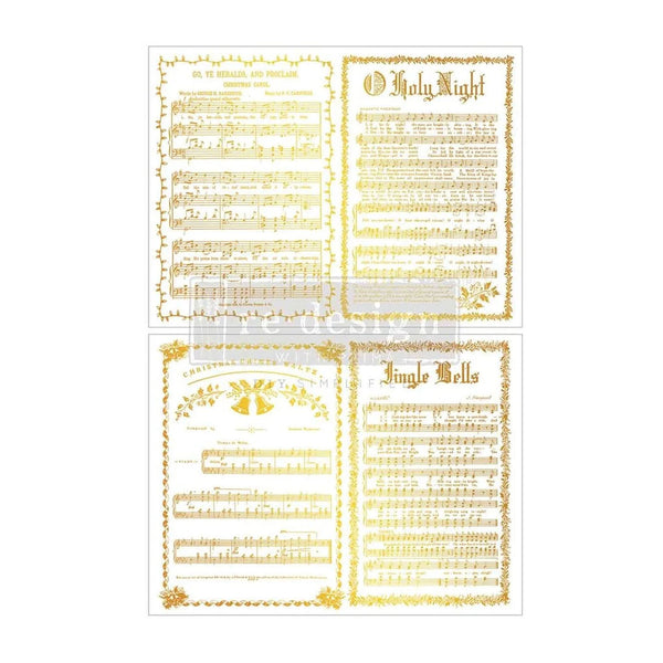 Two gold foil music sheets for Christmas, featuring 'O Holy Night' and 'Jingle Bells' with ornate borders and metallic gold lettering on a white background.