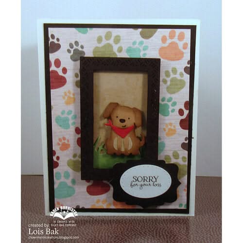Card with a small picture of a dog and paw prints on a colorful background