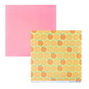 Two square sheets of craft paper on a white background. The left sheet is a solid pink color. The right is a green background with whole and cut in half Oranges.