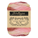 Skein of yarn with 'Scheepjes' label on a white background