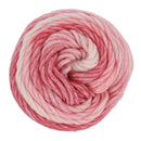 Ball of pink yarn on a white background