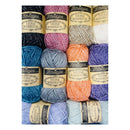 Eight skeins of Scheegjes Stone Washed XL yarn arranged in a grid, showing a variety of colors including black, pink, blue, gray, orange, purple, and light blue.
