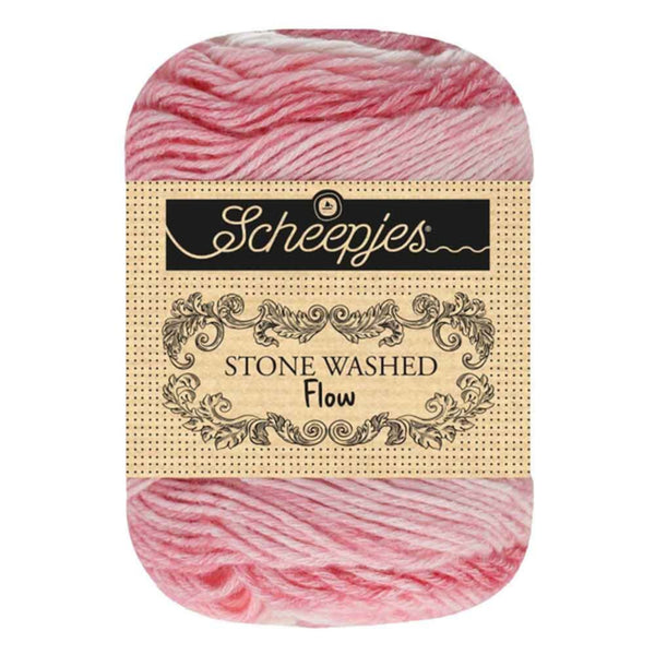 Skein of yarn with 'Scheepjes' label on a white background