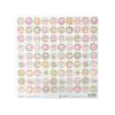A square sheet of decorative stickers featuring a grid of pastel-colored alphabet with various patterns like stripes, stars, and geometric shapes in pink, green, orange, and beige.