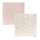 Two square sheets of patterned paper on a white background. The left sheet is a solid pale blush pink, and the right sheet has a cream base with a delicate multicolor floral and botanical print in pink, yellow, and green.
