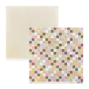 A sheet of cream-colored cardstock paper with a second sheet featuring a colorful mosaic grid pattern in pastel pink, yellow, green, brown, and gray, displayed on a clean white background.