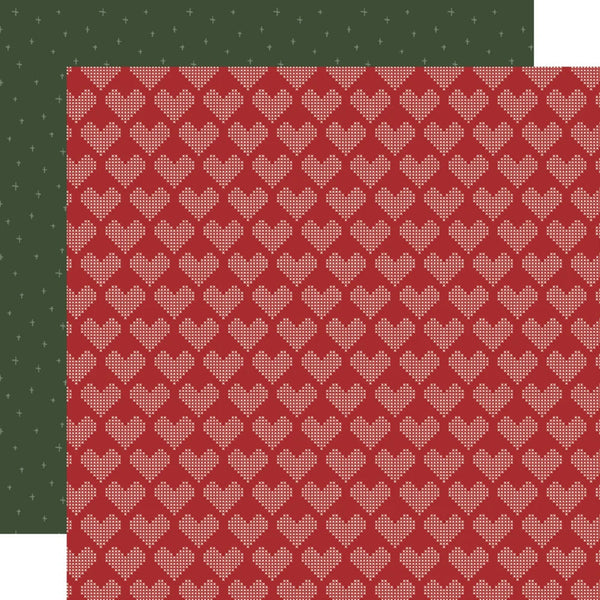 Two patterned paper sheets overlapping, with the front sheet in red and white heart motif and the back sheet in dark green with small white dots.
