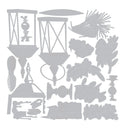A sheet of light gray die-cut stencils or templates featuring various vintage-inspired decorative motifs, including lanterns, floral elements, leaves, and abstract shapes, arranged on a plain white background.