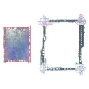 Two decorative square frames on a plain white background: a smaller mauve-pink frame with a blue-purple glittery insert on the left, and a larger dark charcoal frame on the right with ornate pastel corner embellishments.