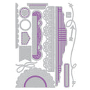 A flat lay of multiple gray paper-cutting or crafting dies with purple decorative linework and lace-like patterns on a plain white background.