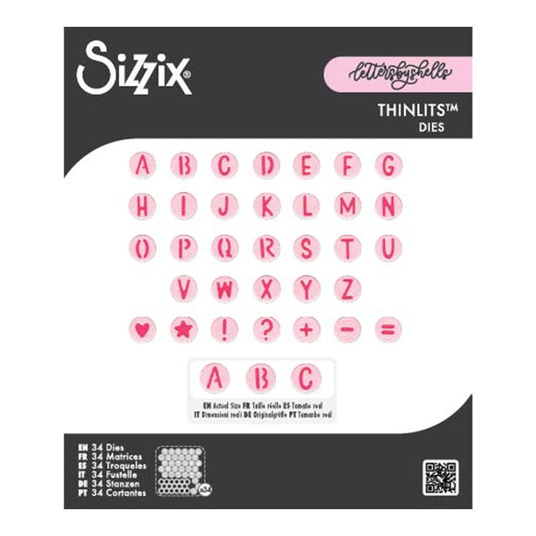 Sizix Letter Itchelle Thinlits Dies packaging showing alphabet and symbol dies in pink circles on a white and dark gray card.