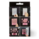 A packaged set of floral stencil templates shown in a six-panel instruction-style card insert. The package has a black header with a hanging hole, and the insert demonstrates how to use the stencils with hands visible over pink and white stencil sheets.