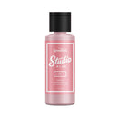 A bottle of Speedball Studio Plus nail polish in shade 06-6 Pink Suede, featuring a light pink bottle, a white and pink label, and a black ribbed cap, set against a plain white background.