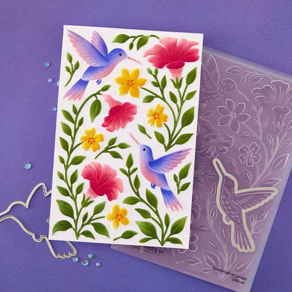 Sheet of colorful bird and flower stickers on a purple background