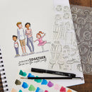 Clear stamps with illustrations of people and objects, a pen, and a color swatch on a wooden surface.
