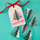 Decorative Christmas tree stickers with a tag on a teal background