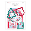 Packaging of Spellbinders chipboard frames and corners with Christmas-themed designs on a white background.
