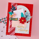 A handmade layered greeting card with a red textured border, pink striped paper, a white arch, and festive embellishments including a red poinsettia, pink flower, teal holly, blue berries, and a yellow banner reading 'Season's Greetings'.