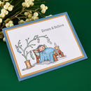 Greeting card with a cartoon bear and butterfly illustration on a green background