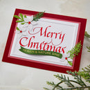 Christmas card with 'Merry Christmas' text and festive decorations on a white background