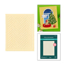 A 3D embossing folder shown next to its retail packaging and a sample card featuring the embossed chevron pattern. The folder is a pale cream color, and the sample card displays a festive Christmas window scene.