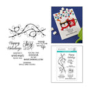 Spells & House holiday stamp set featuring black ink stamp designs and phrases including 'Happy Holidays', 'Joy', 'Winter's warmer with you', and 'You're the cocoa to my marshmallow', shown alongside a sample greeting card and packaging insert.