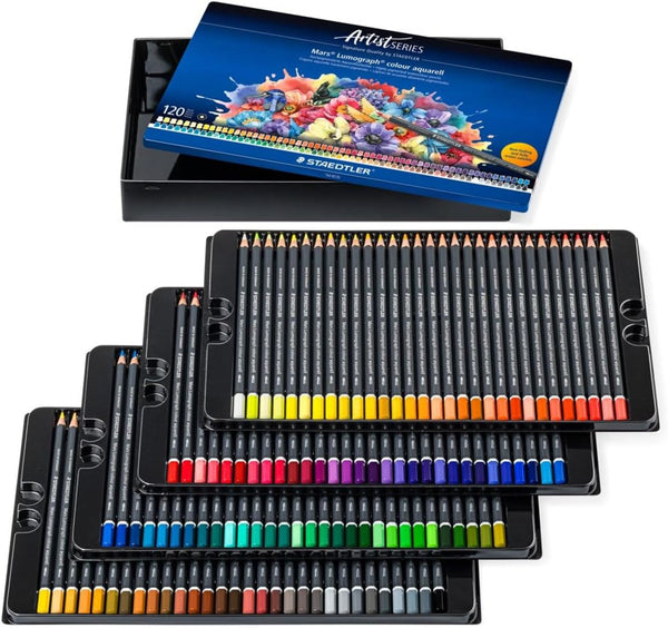 A set of 120 Staedtler Artist LUX colored pencils in a black metal tray, shown with three overlapping trays and the branded blue gift box on a white background.