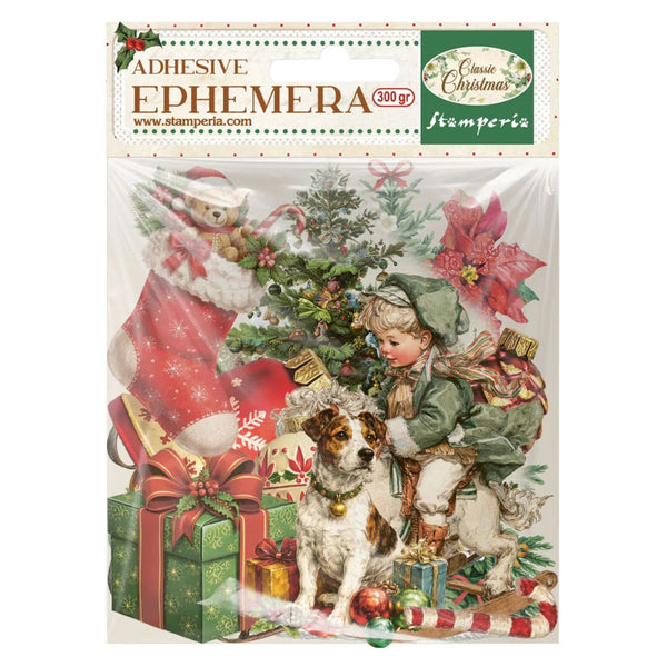 Packaging of Stamperia Christmas adhesive ephemera with Santa Claus, child, and dog.