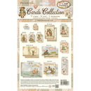 A flat lay of a scrapbooking paper sheet from the brand 'Cozy Family' titled 'Cards Collection' by 'Fresqueria'. The sheet features multiple vintage-style illustrated cards with characters in old dresses, postcards, and tags on a light beige background with a subtle patterned border.