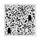 A square stencil or template sheet with a black holiday-themed pattern of gingerbread men, bows, stars, and holly leaves on a light gray background.