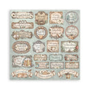 A square decorative paper or scrapbook sheet featuring multiple vintage-style quote frames and embellishments on a pale blue-green background. The designs include floral borders, ribbon banners, small illustrations, and handwritten phrases such as 'This quiet feels full', 'Hold what matters', 'Home is a feeling', and 'Trust enough to love'.