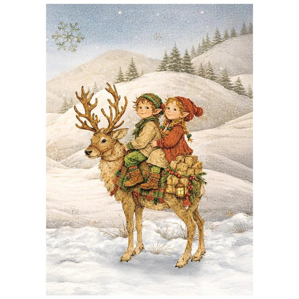 A vintage-style winter illustration showing two children riding on the back of a reindeer in a snowy landscape, with snow-covered hills, evergreen trees, and falling snow in the background.