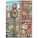 A whimsical illustrated scene showing a small fluffy cat sitting beside a brick wall with graffiti and a birdhouse, with a fuzzy red creature perched on top of the birdhouse. The artwork is presented on a white background.