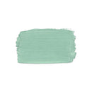 A textured paint swatch of mint green on a solid white background.