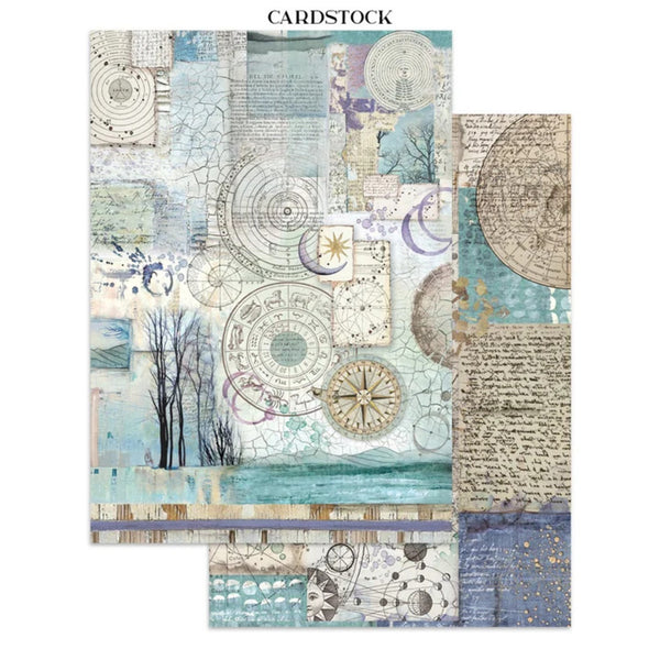 A sheet of cardstock featuring a collage of vintage-style celestial and nautical motifs, including compass roses, moon phases, handwritten script, and textured paper in soft blue, beige, and gray tones. A second overlapping sheet is shown to the right, and the word 'CARDSTOCK' appears at the top on a white background.