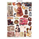 A sheet of vintage-style die-cut stickers featuring a collage of travel and fashion motifs, including a woman in a hat reading a map, a pink double-decker bus, cameras, lipstick, makeup, a cathedral, and luggage, all on an aged cream background.